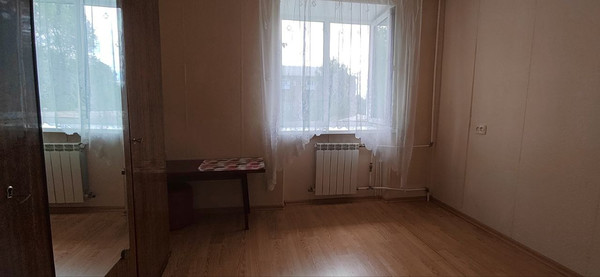 Купить --комнатную квартиру